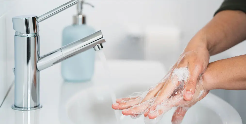 Wash and dry hands before handling contact lenses
